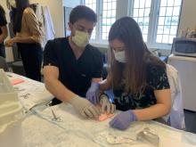 Residents in suture lab (2)