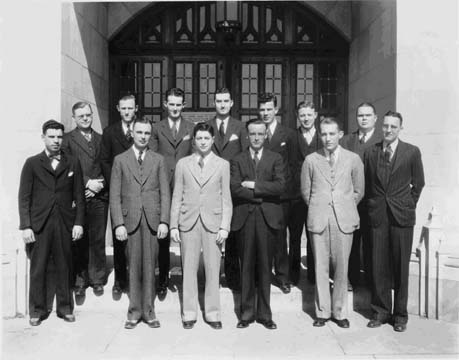 Black and white photo of a group of men