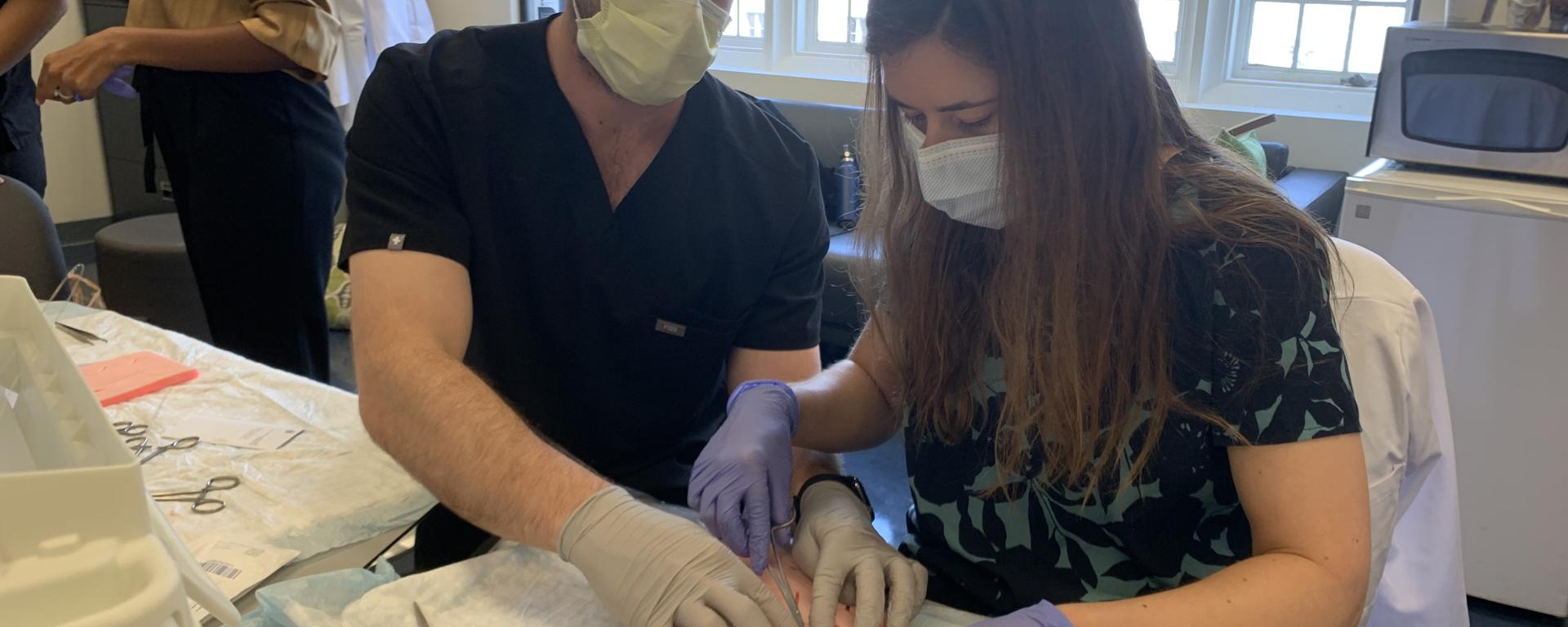 Residents in suture lab (2)